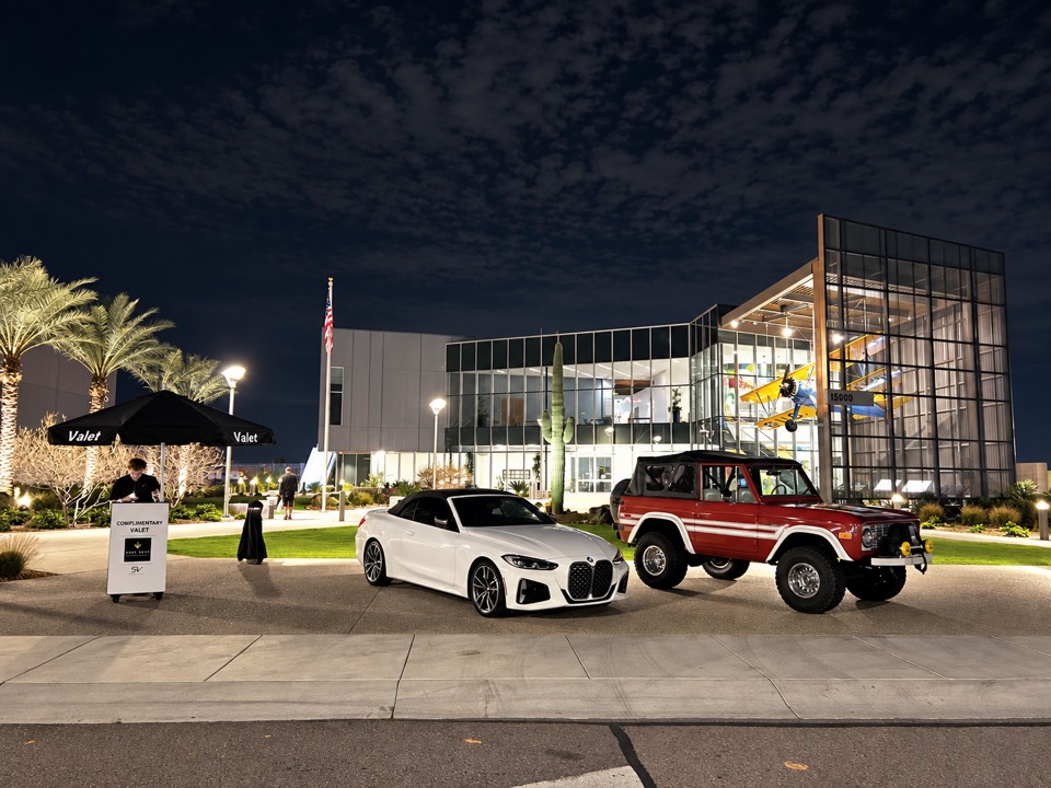 Guests’ cars staged at a Royal Valet stand outside an evening event at Volanti